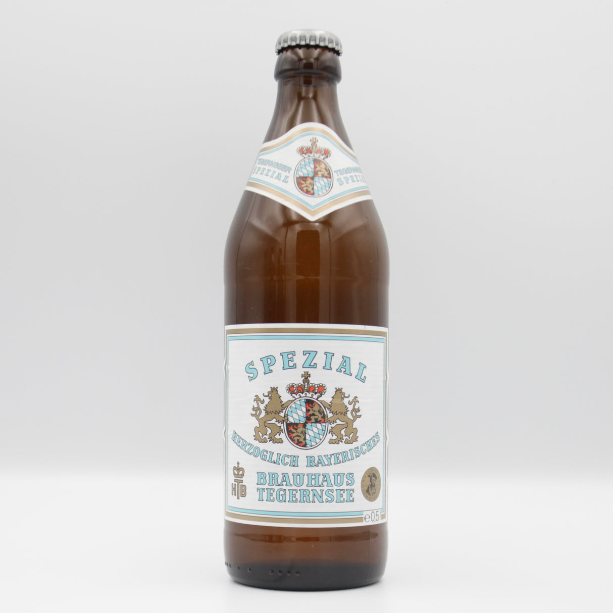 This is a bottle of Tegernseer - Spezial - 5.6% (500ml). It is a Lager / Pilsner / Kölsch craft beer available to buy from Ghost Whale, voted London's best craft beer shop.