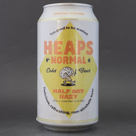 This is a can of Heaps Normal - Half Day Hazy - 0.5% (375ml). It is a Pale Ale craft beer available to buy from Ghost Whale, voted London's best craft beer shop.