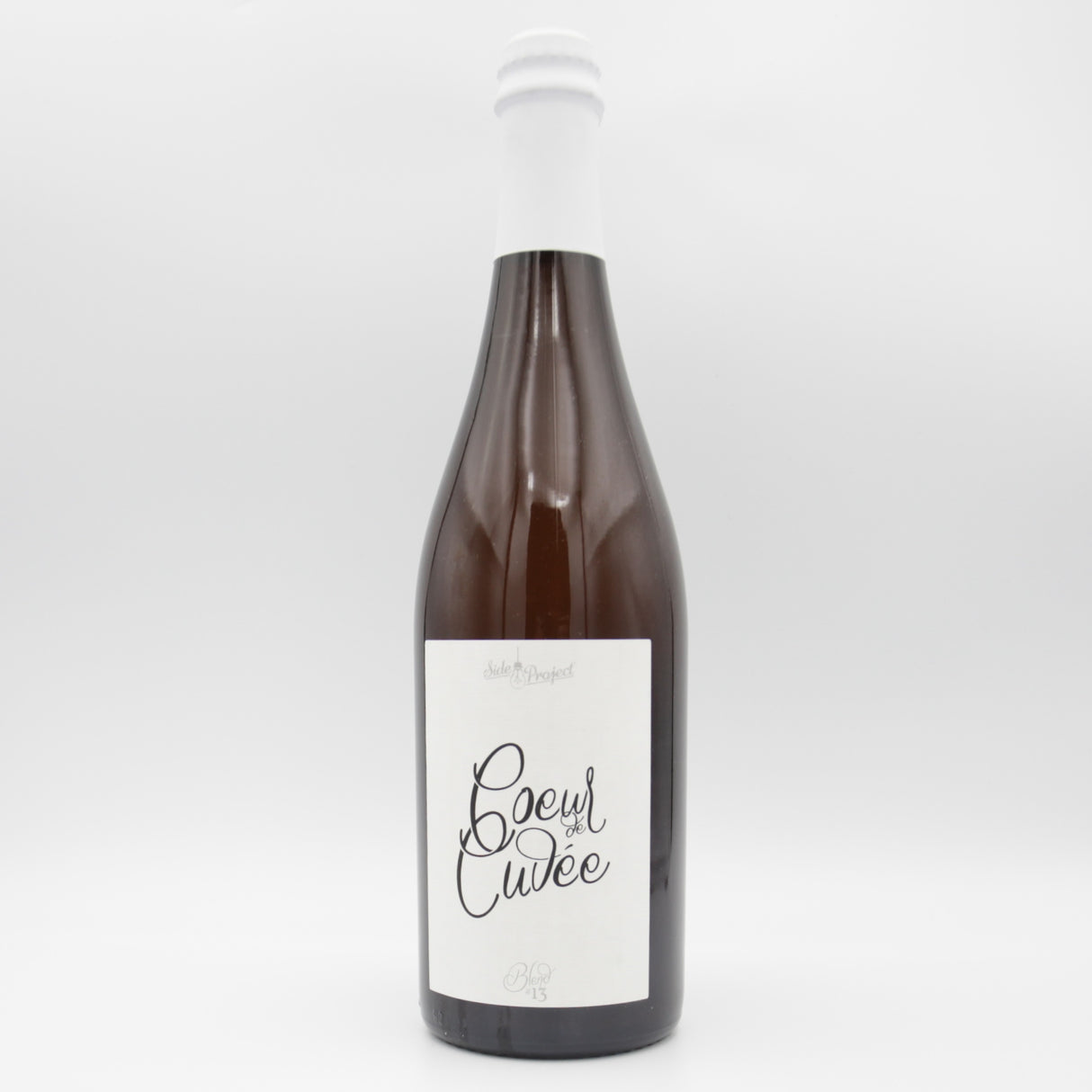 This is a sharing bottle of Side Project - Coeur de Cuvée: Blend #13 - 6% (750ml). It is a Saison craft beer available to buy from Ghost Whale, voted London's best craft beer shop.