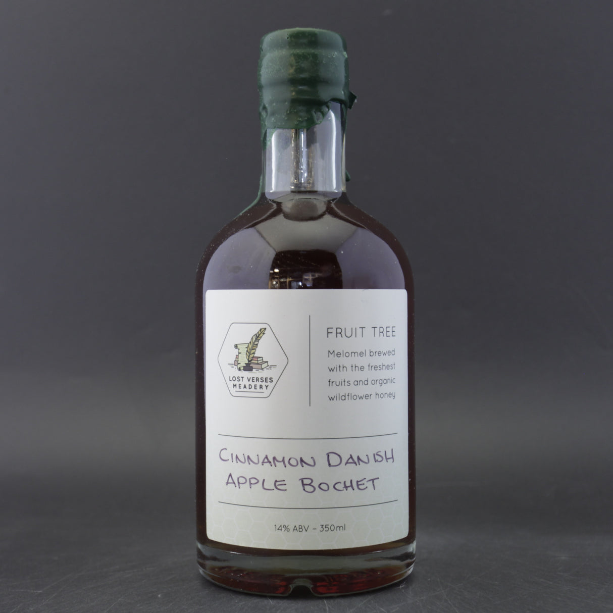 This is a bottle of Lost Verses Meadery - Cinnamon Danish Apple Bochet - 14% (350ml). It is a craft mead available to buy from Ghost Whale, voted London's best craft beer shop.