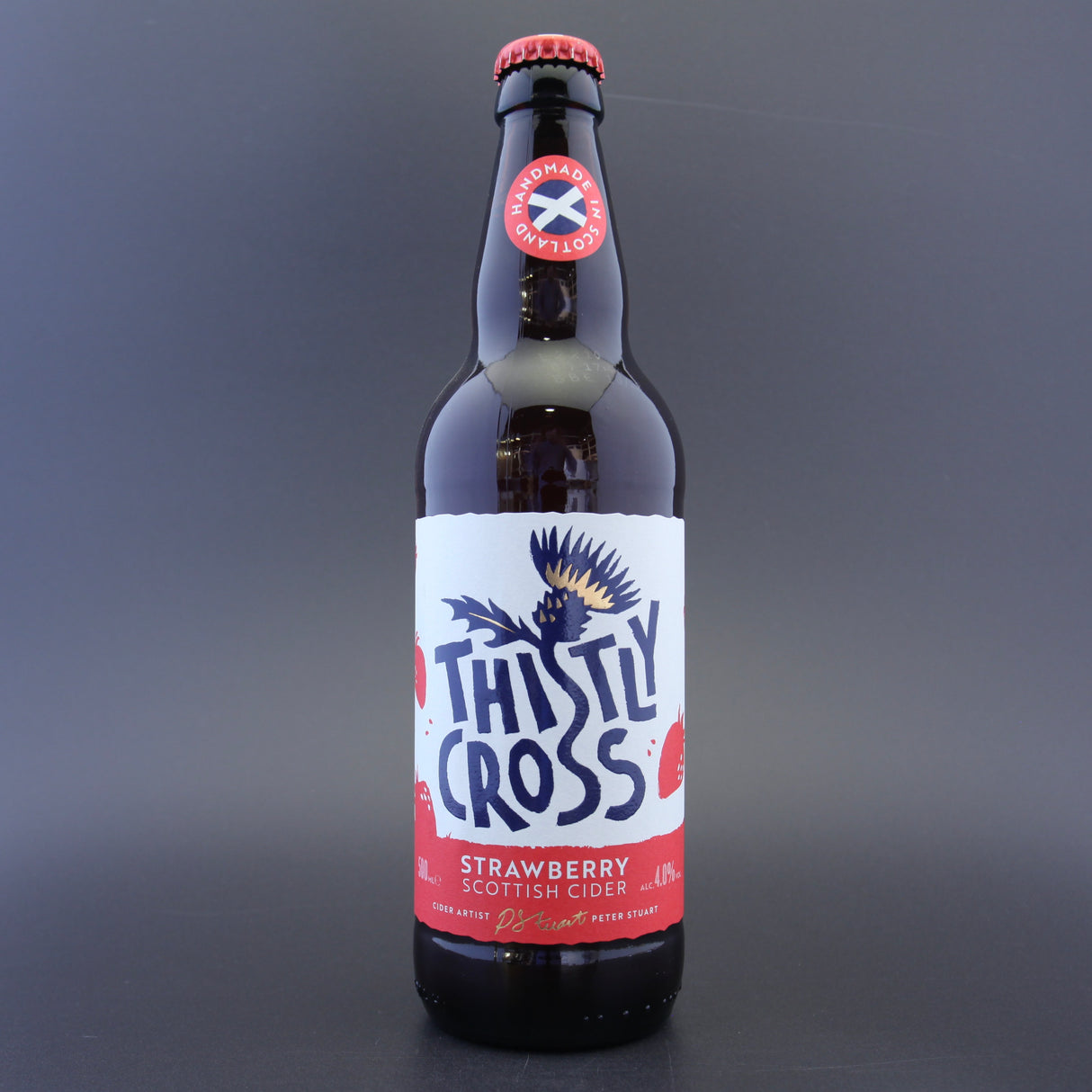 This is a bottle of Thistly Cross - Strawberry - 4% (500ml). It is a  craft cider available to buy from Ghost Whale, voted London's best craft beer shop.