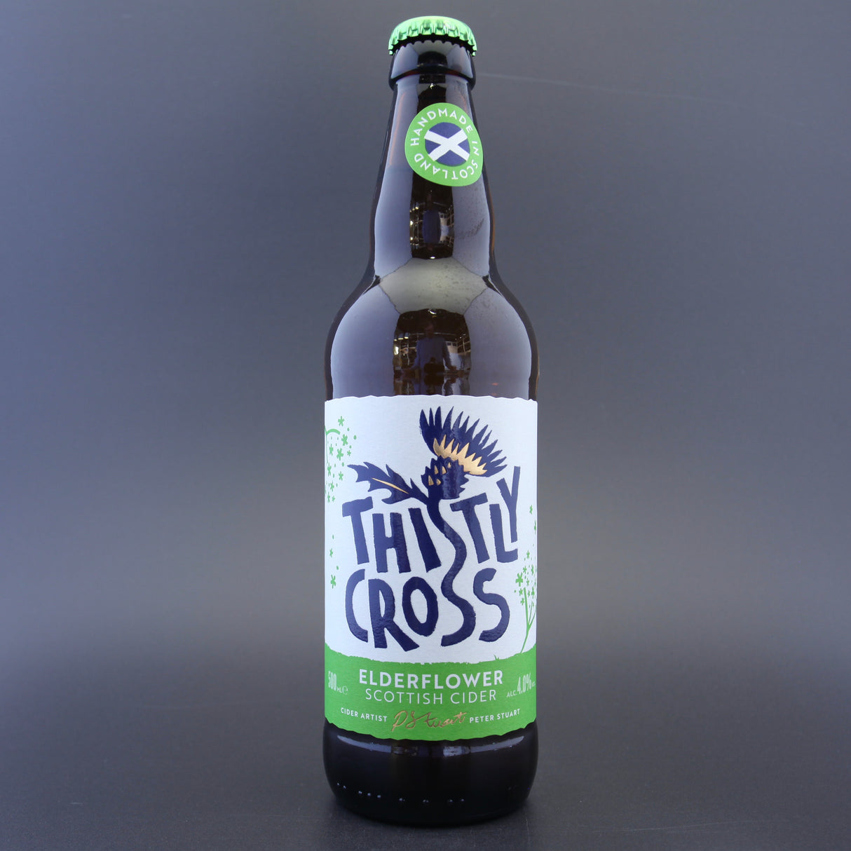 This is a bottle of Thistly Cross - Elderflower Cider - 4% (500ml). It is a  craft cider available to buy from Ghost Whale, voted London's best craft beer shop.
