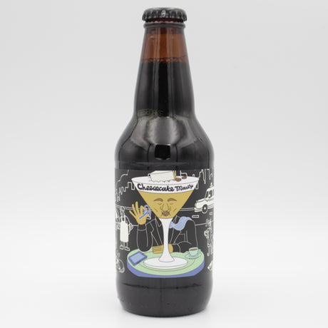 This is a bottle of Prairie - Cheesecake Marty - 14.9% (355ml). It is a Imperial Stout / Porter craft beer available to buy from Ghost Whale, voted London's best craft beer shop.