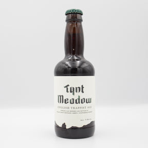 This is a bottle of Tynt Meadow - English Trappist Ale - 7.4% (330ml). It is a Belgian Style craft beer available to buy from Ghost Whale, voted London's best craft beer shop.