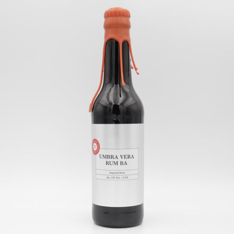 This is a bottle of Puhaste - Umbra Vera - 13% (330ml). It is a Imperial Stout / Porter craft beer available to buy from Ghost Whale, voted London's best craft beer shop.