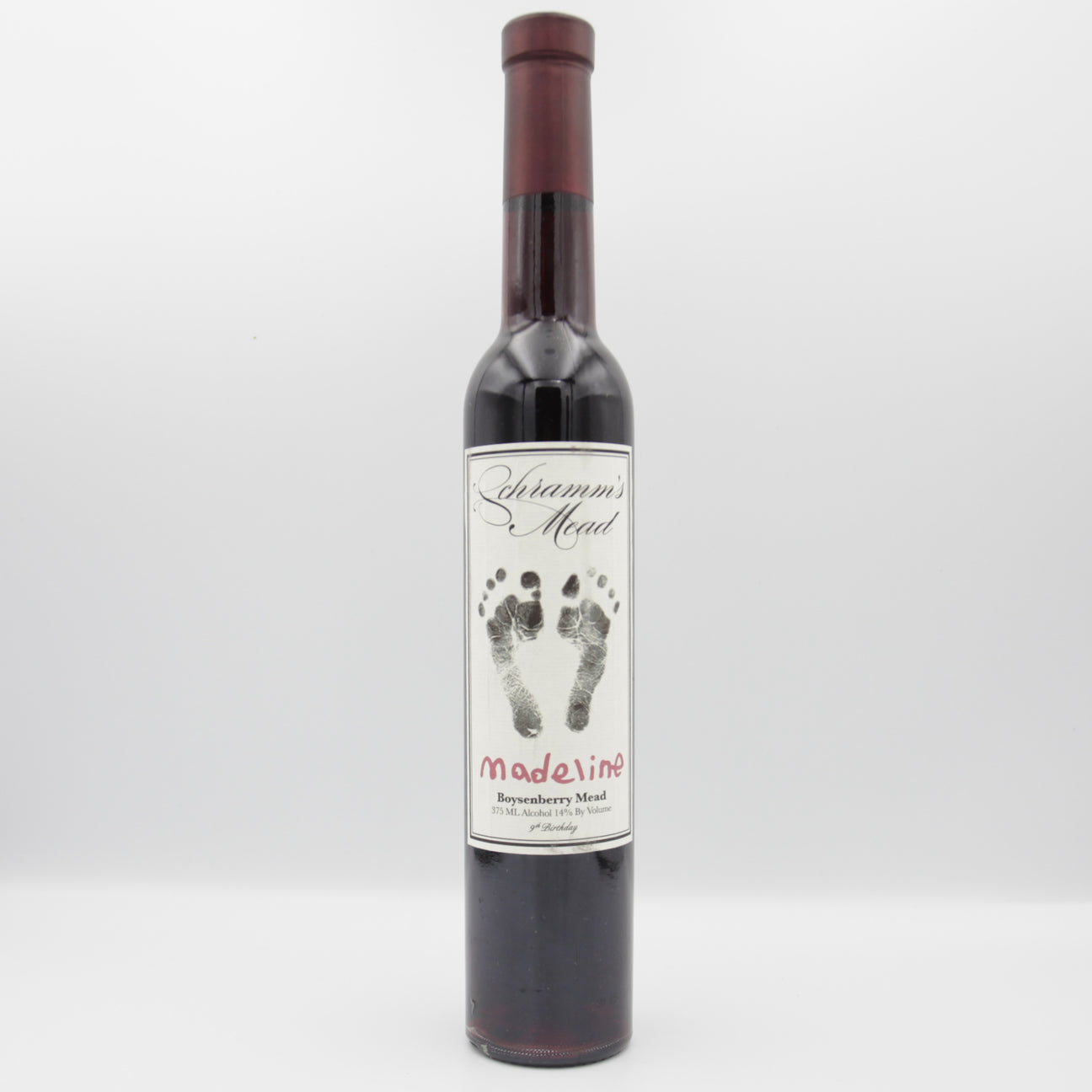 This is a bottle of Schramm's Mead - Madaline 9th Birthday: Boysenberry - 14% (375ml). It is a  craft mead available to buy from Ghost Whale, voted London's best craft beer shop.