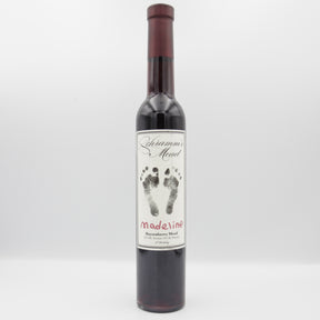 This is a bottle of Schramm's Mead - Madaline 9th Birthday: Boysenberry - 14% (375ml). It is a  craft mead available to buy from Ghost Whale, voted London's best craft beer shop.