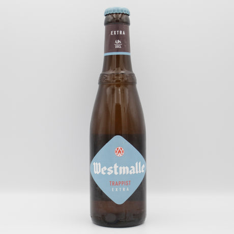 This is a bottle of Westmalle - Extra - 4.8% (330ml). It is a Belgian Style craft beer available to buy from Ghost Whale, voted London's best craft beer shop.