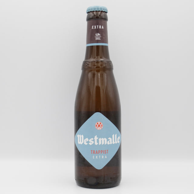 This is a bottle of Westmalle - Extra - 4.8% (330ml). It is a Belgian Style craft beer available to buy from Ghost Whale, voted London's best craft beer shop.