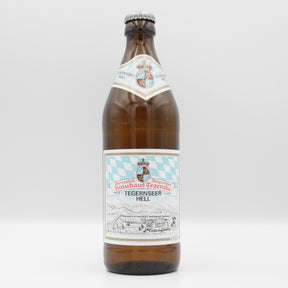 This is a bottle of Tegernseer - Hell - 4.8% (500ml). It is a Lager / Pilsner / Kölsch craft beer available to buy from Ghost Whale, voted London's best craft beer shop.