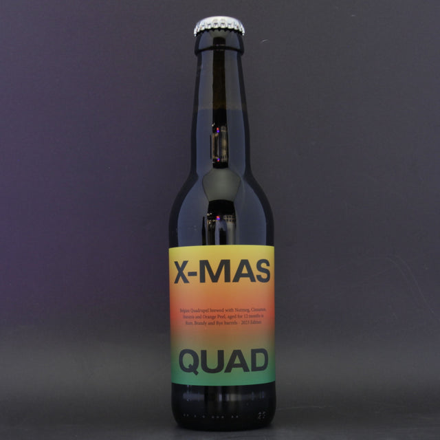 This is a bottle of To Øl - Xmas Quad BA 2023 - 11% (330ml). It is a Belgian Style craft beer available to buy from Ghost Whale, voted London's best craft beer shop.