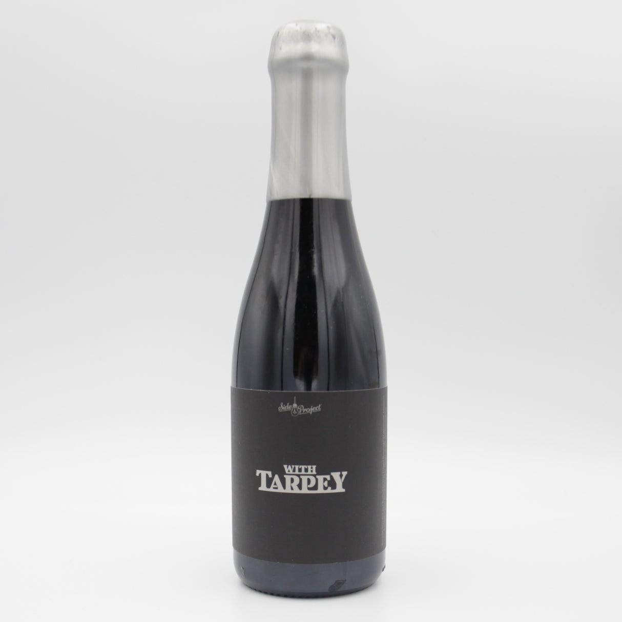 This is a bottle of Side Project / The Veil - With Tarpey - 15% (375ml). It is a Imperial Stout / Porter craft beer available to buy from Ghost Whale, voted London's best craft beer shop.