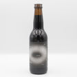 This is a bottle of Mikkeller - Black Hole - 13.1% (330ml). It is a Imperial Stout / Porter craft beer available to buy from Ghost Whale, voted London's best craft beer shop.
