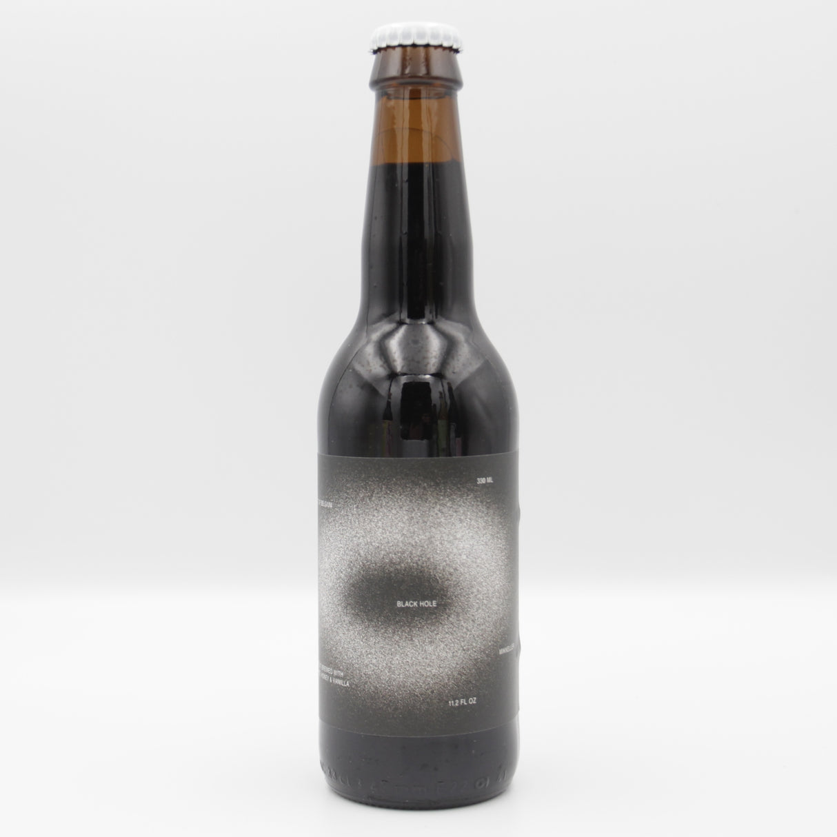 This is a bottle of Mikkeller - Black Hole - 13.1% (330ml). It is a Imperial Stout / Porter craft beer available to buy from Ghost Whale, voted London's best craft beer shop.