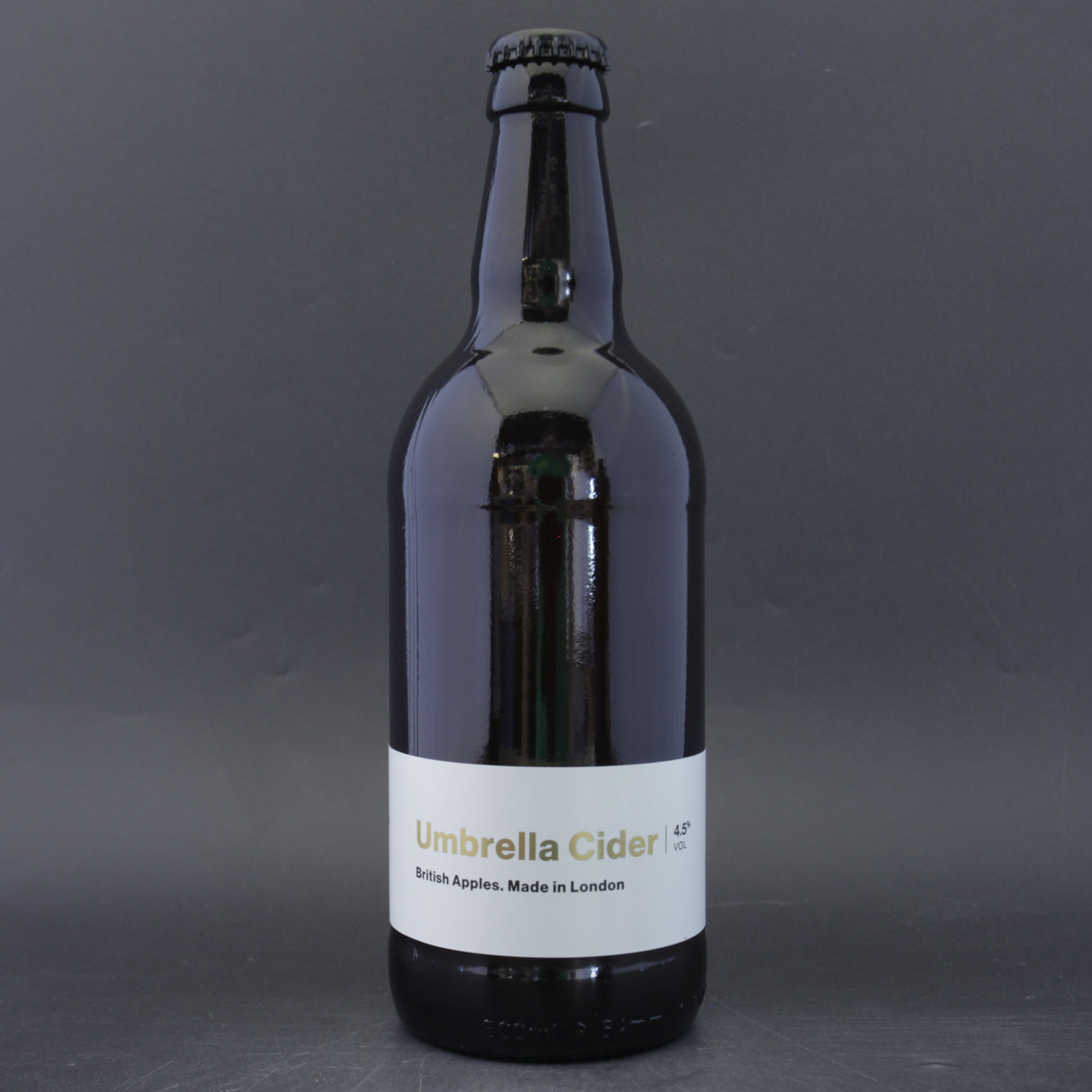 This is a bottle of Umbrella Brewing - Cider - 4.5% (500ml). It is a  craft cider available to buy from Ghost Whale, voted London's best craft beer shop.