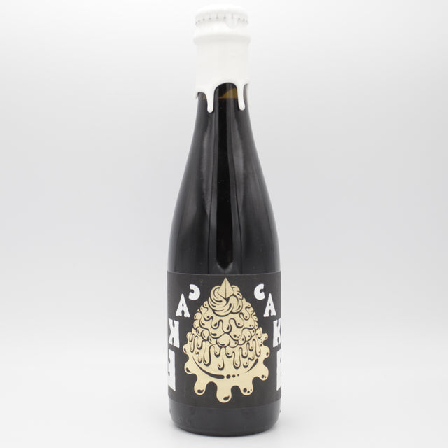This is a bottle of Omnipollo - Cake - 15% (375ml). It is a Imperial Stout / Porter craft beer available to buy from Ghost Whale, voted London's best craft beer shop.