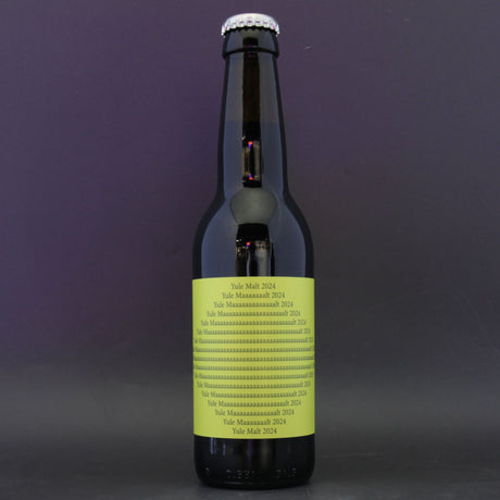 This is a bottle of To Øl - Yule Malt BA 2024 - 12.3% (330ml). It is a Imperial Stout / Porter craft beer available to buy from Ghost Whale, voted London's best craft beer shop.