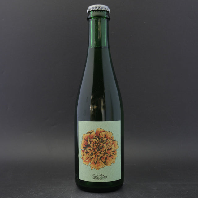 This is a bottle of Fonta Flora - Mary's Gold - 5.2% (500ml). It is a Saison craft beer available to buy from Ghost Whale, voted London's best craft beer shop.