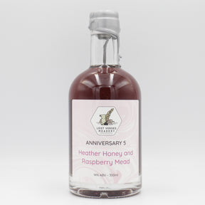 This is a bottle of Lost Verses Meadery - Anniversary Five - 14% (350ml). It is a  craft mead available to buy from Ghost Whale, voted London's best craft beer shop.
