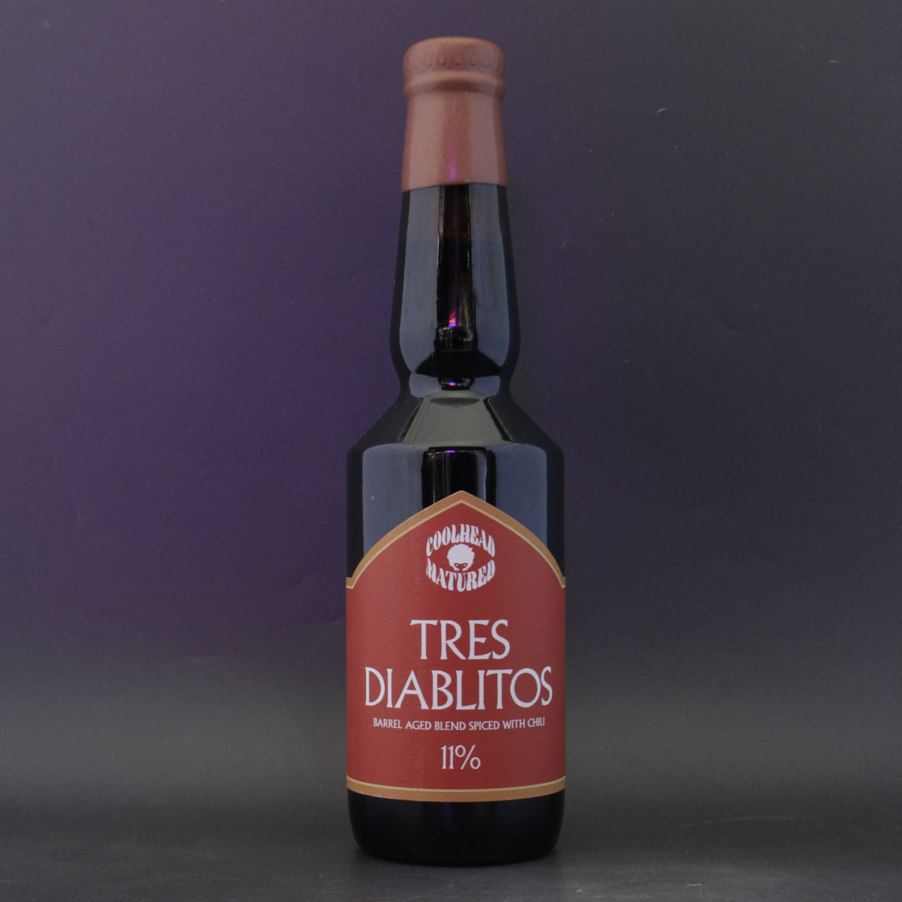 This is a bottle of Coolhead Brew - Tres Diabolitos - 11% (330ml). It is a Imperial Stout / Porter craft beer available to buy from Ghost Whale, voted London's best craft beer shop.