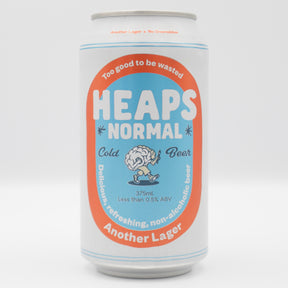 This is a can of Heaps Normal - Another Lager - 0.5% (375ml). It is a Lager / Pilsner / Kölsch craft beer available to buy from Ghost Whale, voted London's best craft beer shop.
