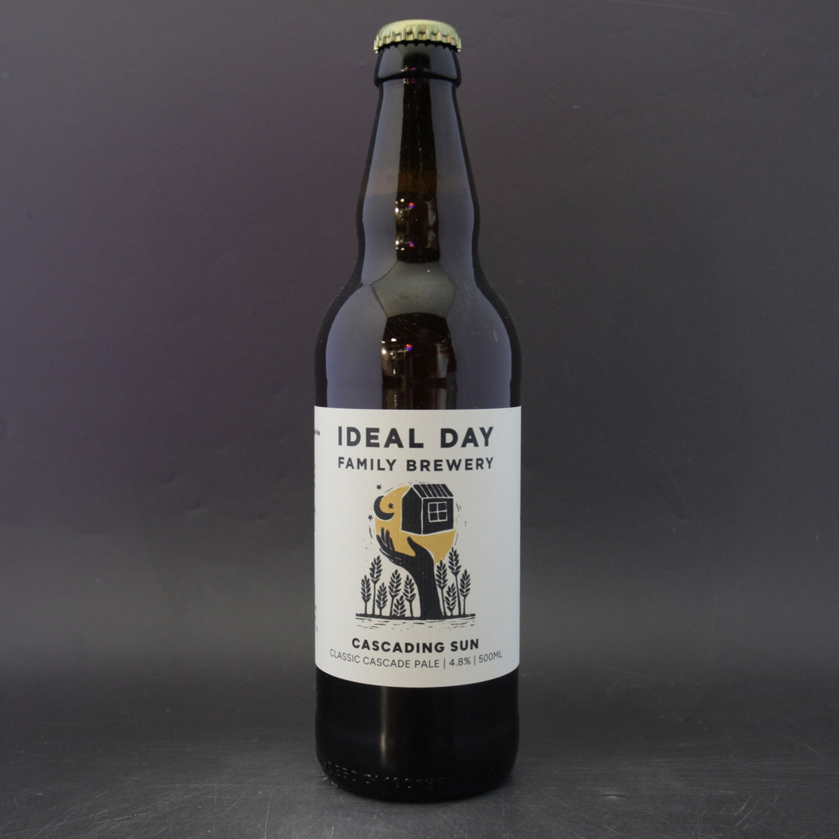 This is a bottle of Ideal Day - Cascading Sun - 4.8% (500ml). It is a Pale Ale craft beer available to buy from Ghost Whale, voted London's best craft beer shop.
