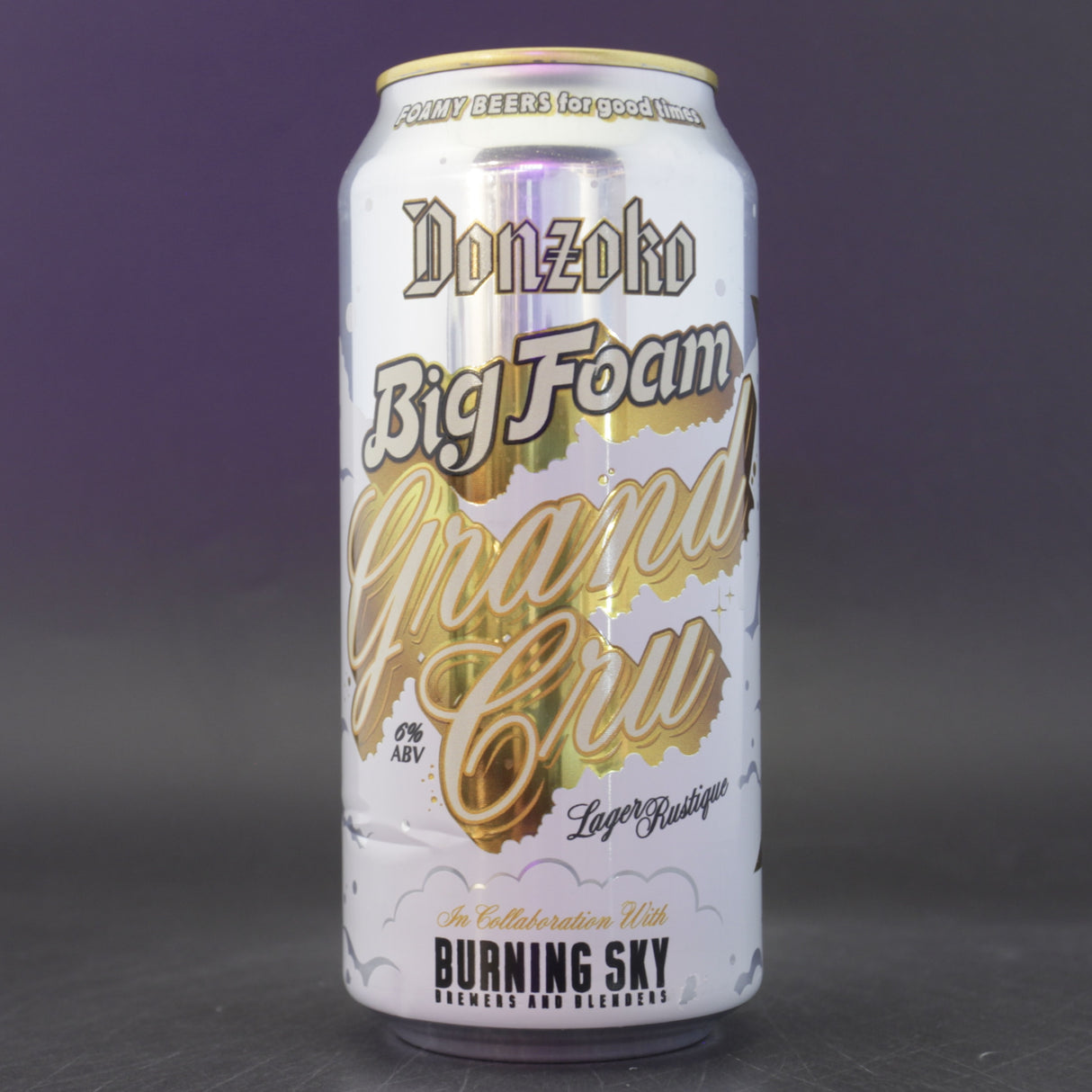 This is a can of Donzoko / Burning Sky - Big Foam Grand Cru - 6% (440ml). It is a Lager / Pilsner / Kölsch craft beer available to buy from Ghost Whale, voted London's best craft beer shop.