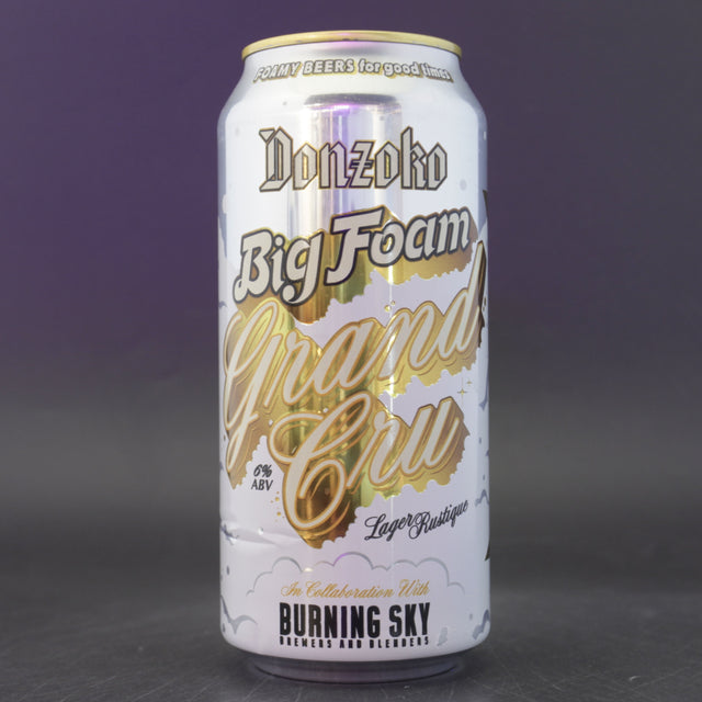 This is a can of Donzoko / Burning Sky - Big Foam Grand Cru - 6% (440ml). It is a Lager / Pilsner / Kölsch craft beer available to buy from Ghost Whale, voted London's best craft beer shop.