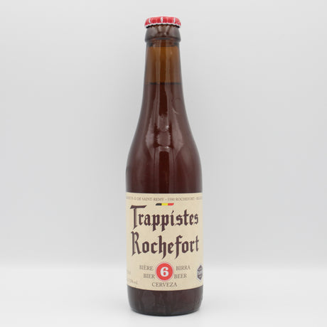 This is a bottle of Trappistes Rochefort - 6 - 7.5% (330ml). It is a Belgian Style craft beer available to buy from Ghost Whale, voted London's best craft beer shop.