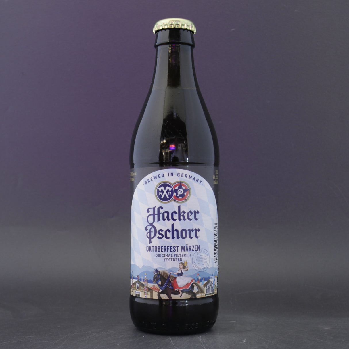 This is a bottle of Hacker Pschorr - Oktoberfest - 5.8% (330ml). It is a Lager / Pilsner / Kölsch craft beer available to buy from Ghost Whale, voted London's best craft beer shop.