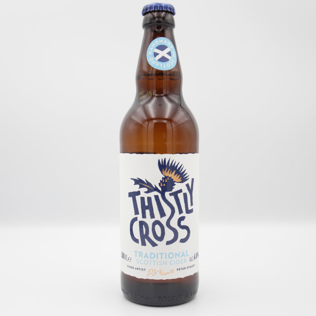 This is a bottle of Thistly Cross - Traditional - 4.4% (500ml). It is a  craft cider available to buy from Ghost Whale, voted London's best craft beer shop.