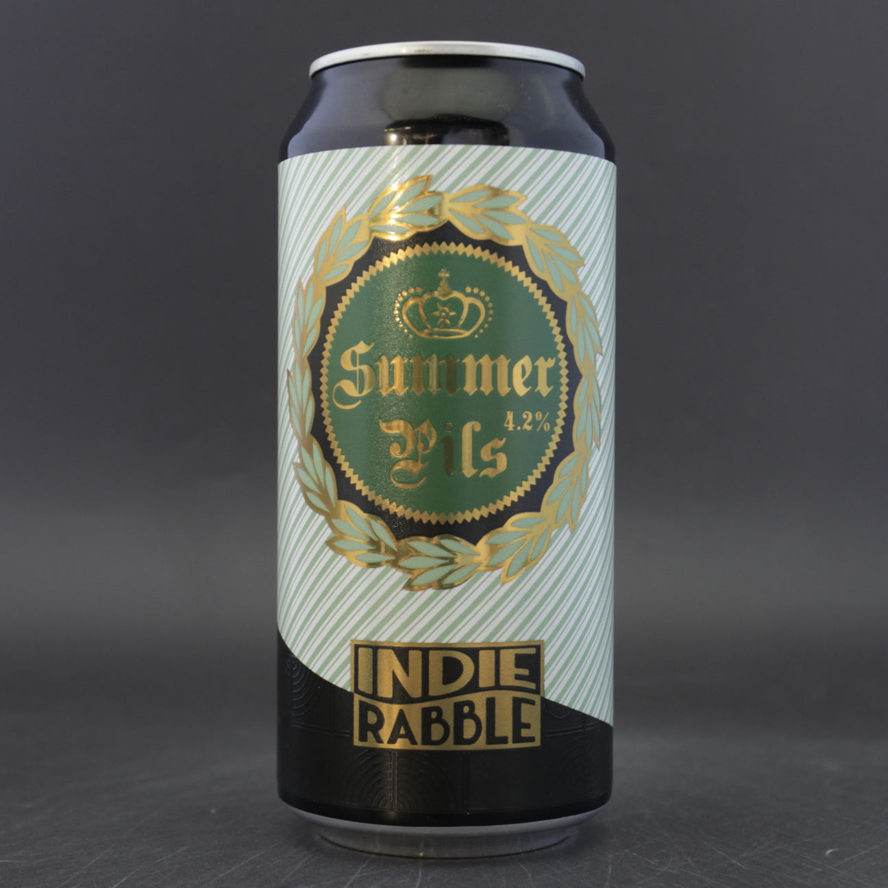 This is a can of Indie Rabble - Summer Pils - 4.2% (440ml). It is a Lager / Pilsner / Kölsch craft beer available to buy from Ghost Whale, voted London's best craft beer shop.