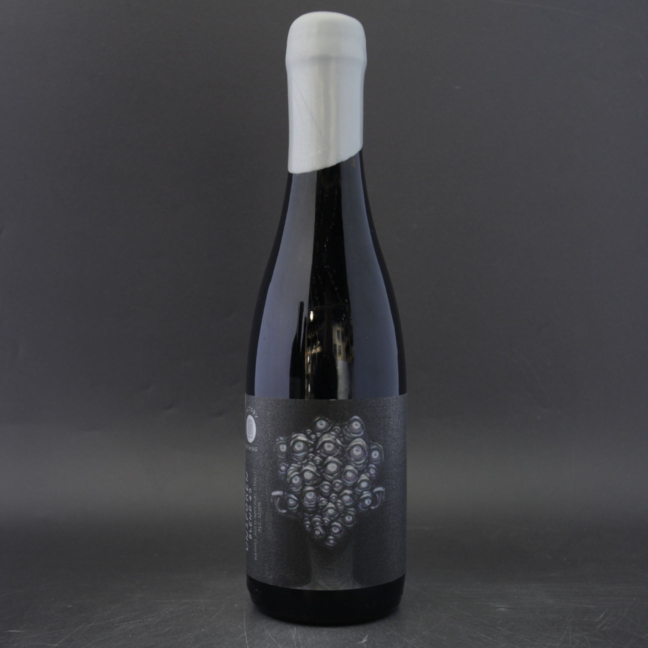 This is a bottle of Factory Brewing - Unspoken #3 - 12% (375ml). It is a Imperial Stout / Porter craft beer available to buy from Ghost Whale, voted London's best craft beer shop.