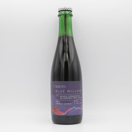This is a bottle of Burnt Mill - Blue Willow - 7.4% (375ml). It is a Wild Ale craft beer available to buy from Ghost Whale, voted London's best craft beer shop.