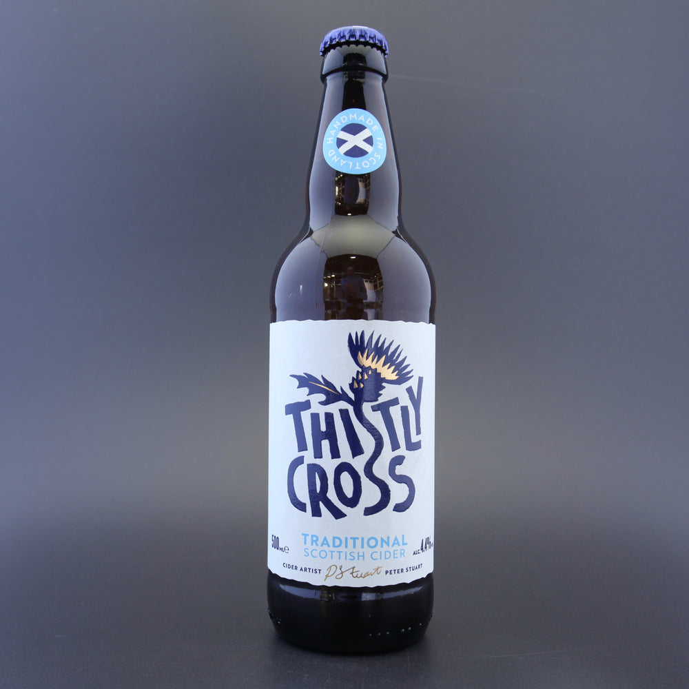 This is a bottle of Thistly Cross - Traditional - 4.4% (500ml). It is a  craft cider available to buy from Ghost Whale, voted London's best craft beer shop.
