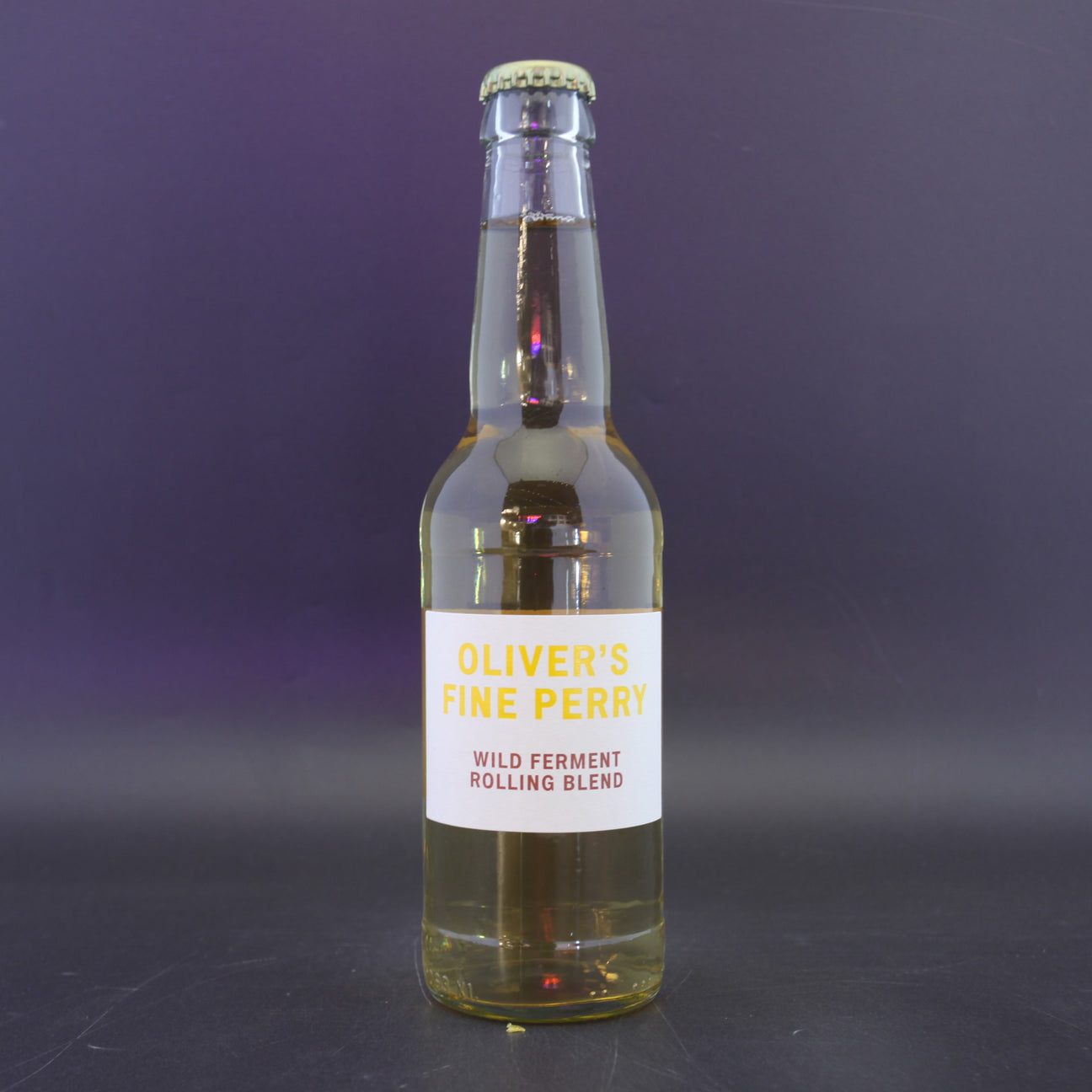 This is a bottle of Oliver's - Fine Perry - 6% (330ml). It is a  craft cider available to buy from Ghost Whale, voted London's best craft beer shop.