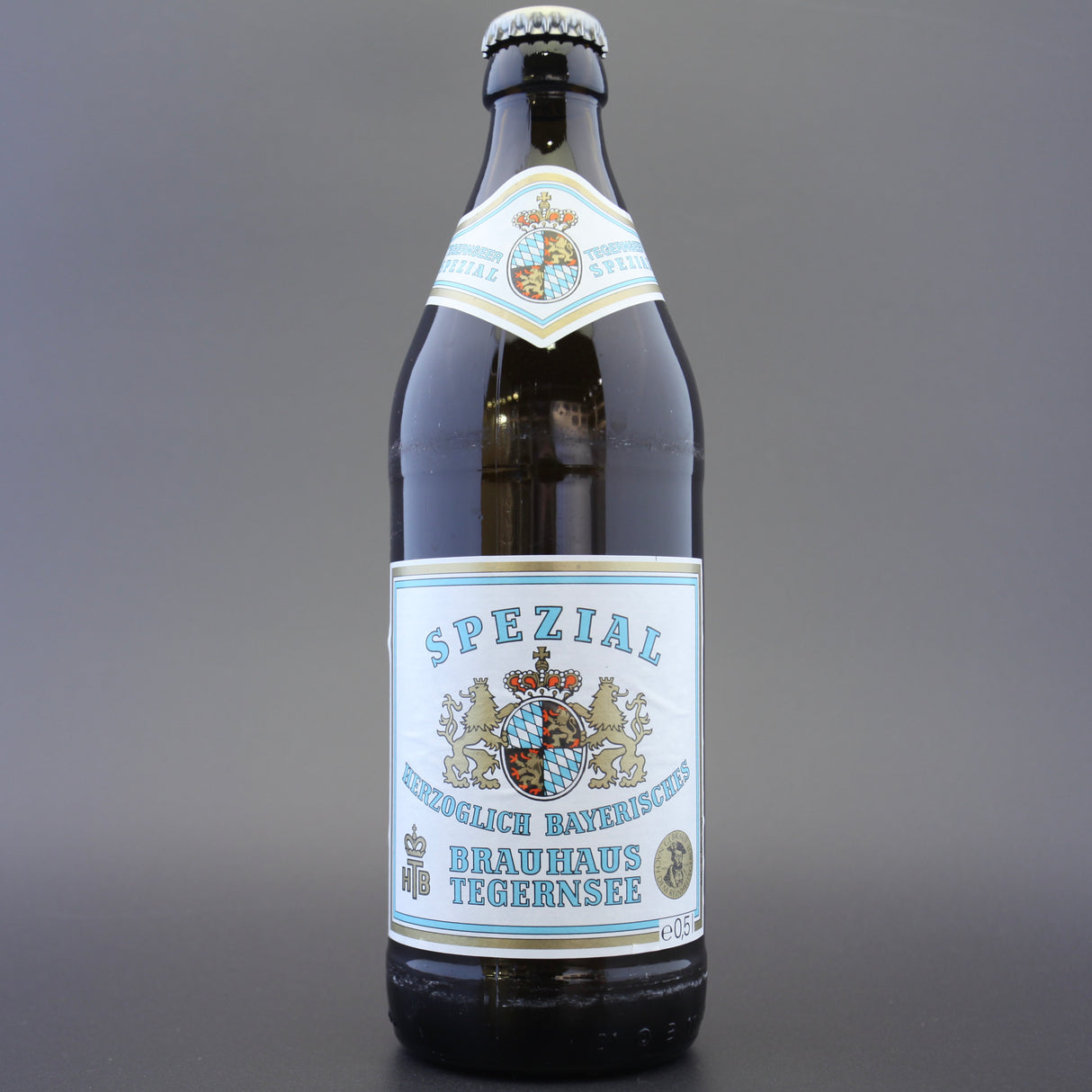 This is a bottle of Tegernseer - Spezial - 5.6% (500ml). It is a Lager / Pilsner / Kölsch craft beer available to buy from Ghost Whale, voted London's best craft beer shop.