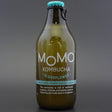 This is a bottle of Momo - Elderflower Kombucha - 0% (330ml). It is a  craft soft drink available to buy from Ghost Whale, voted London's best craft beer shop.