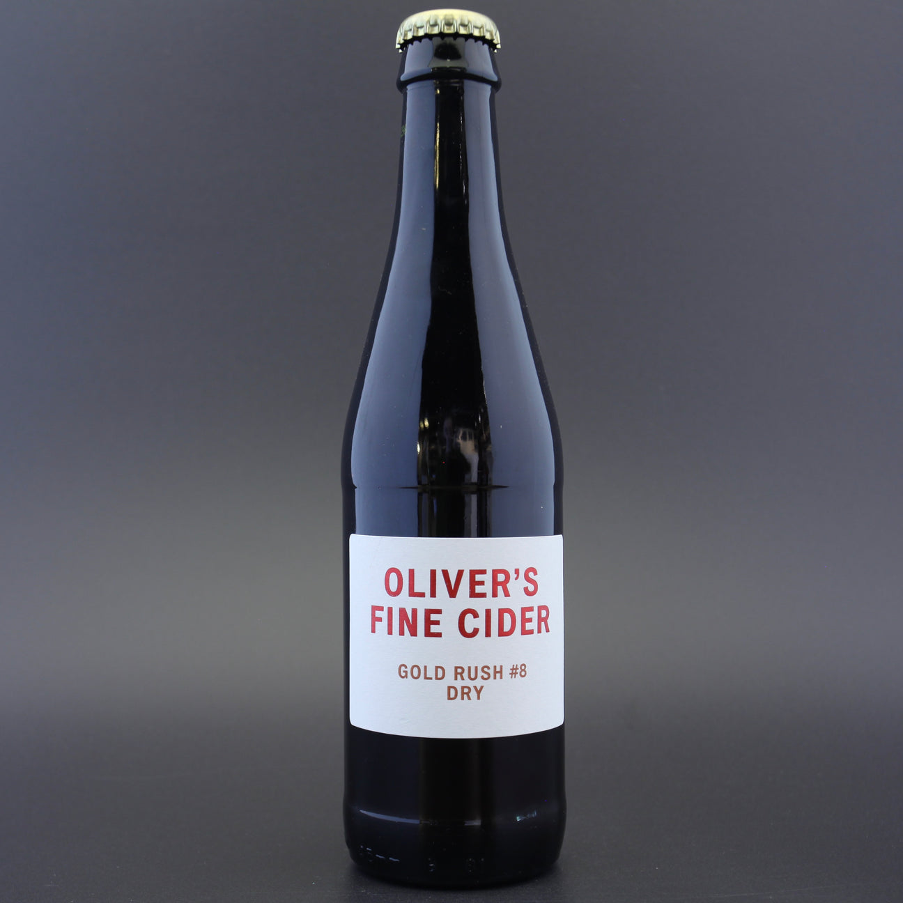 This is a bottle of Oliver's - Gold Rush - 6.5% (330ml). It is a  craft cider available to buy from Ghost Whale, voted London's best craft beer shop.